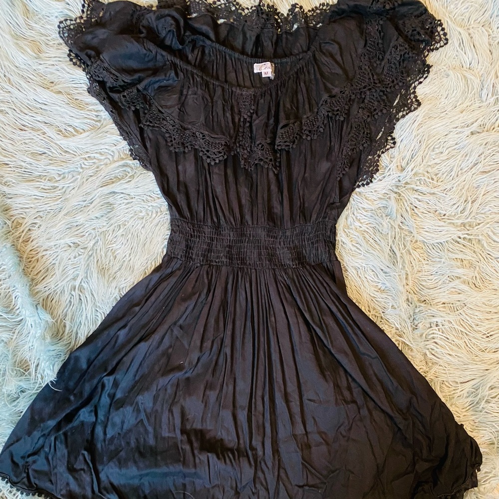 Ruffle off the shoulder dress. Very cute with lots of detail.